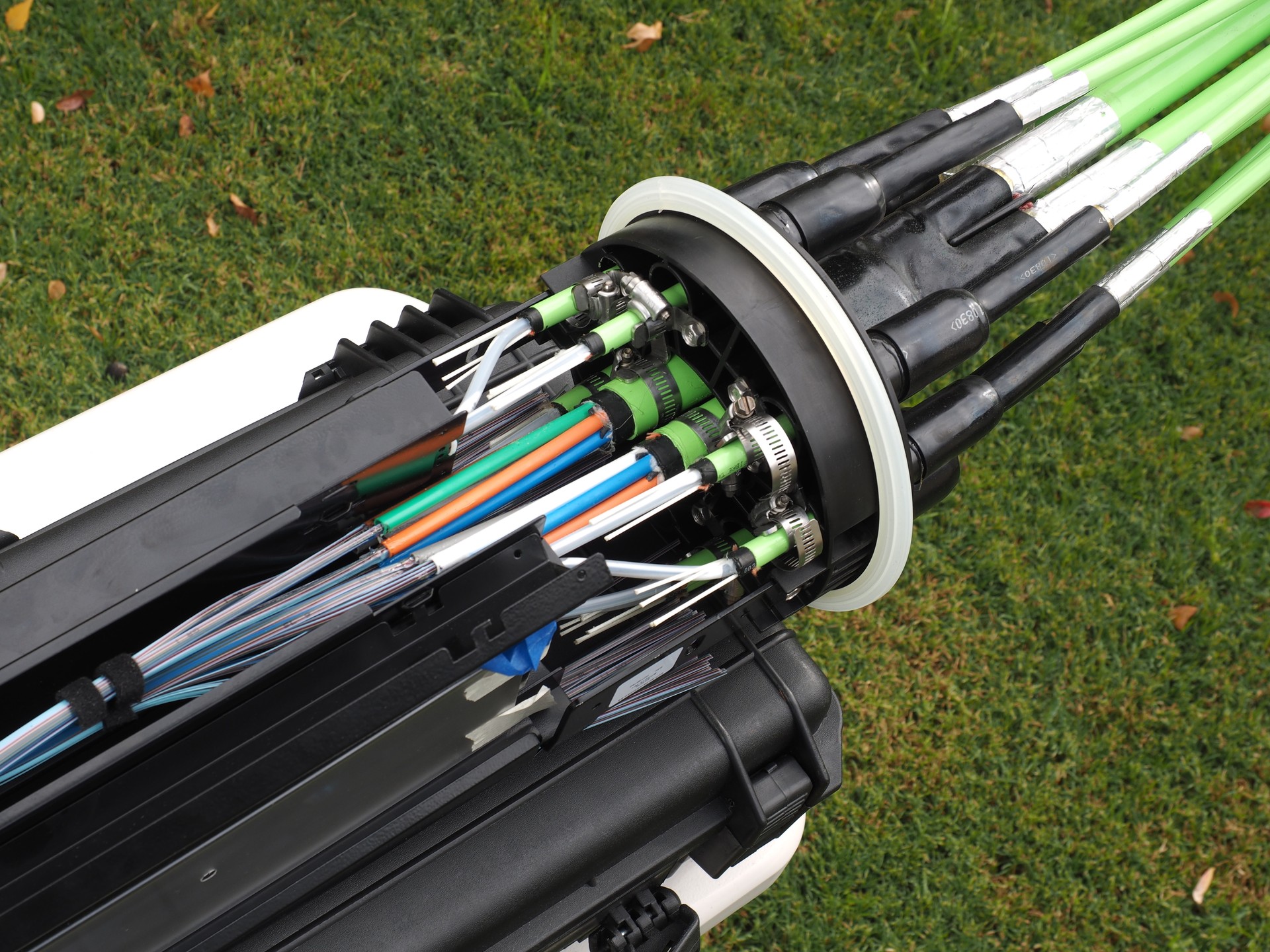 Fiber optic mass closure with cable entry ports